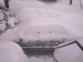Allison's car, parked in my driveway, before shoveling it out