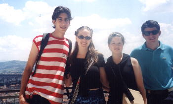 Victory shot--the top or 463 stairs, and the top of Florence (Joel, me, Liv, & Richard)