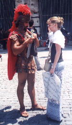 Hanna wants her picture taken with a gladiator, but he wants money