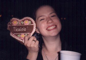 Olivia with a gingerbread cookie and pivo