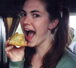 Me demolishing a leftover samosa, mmmM!